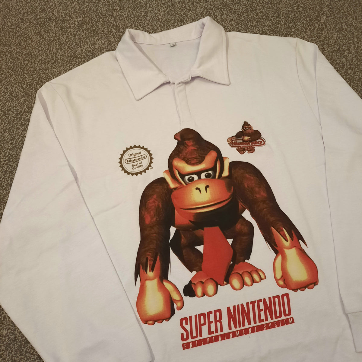 G.O.A.T long sleeve polo